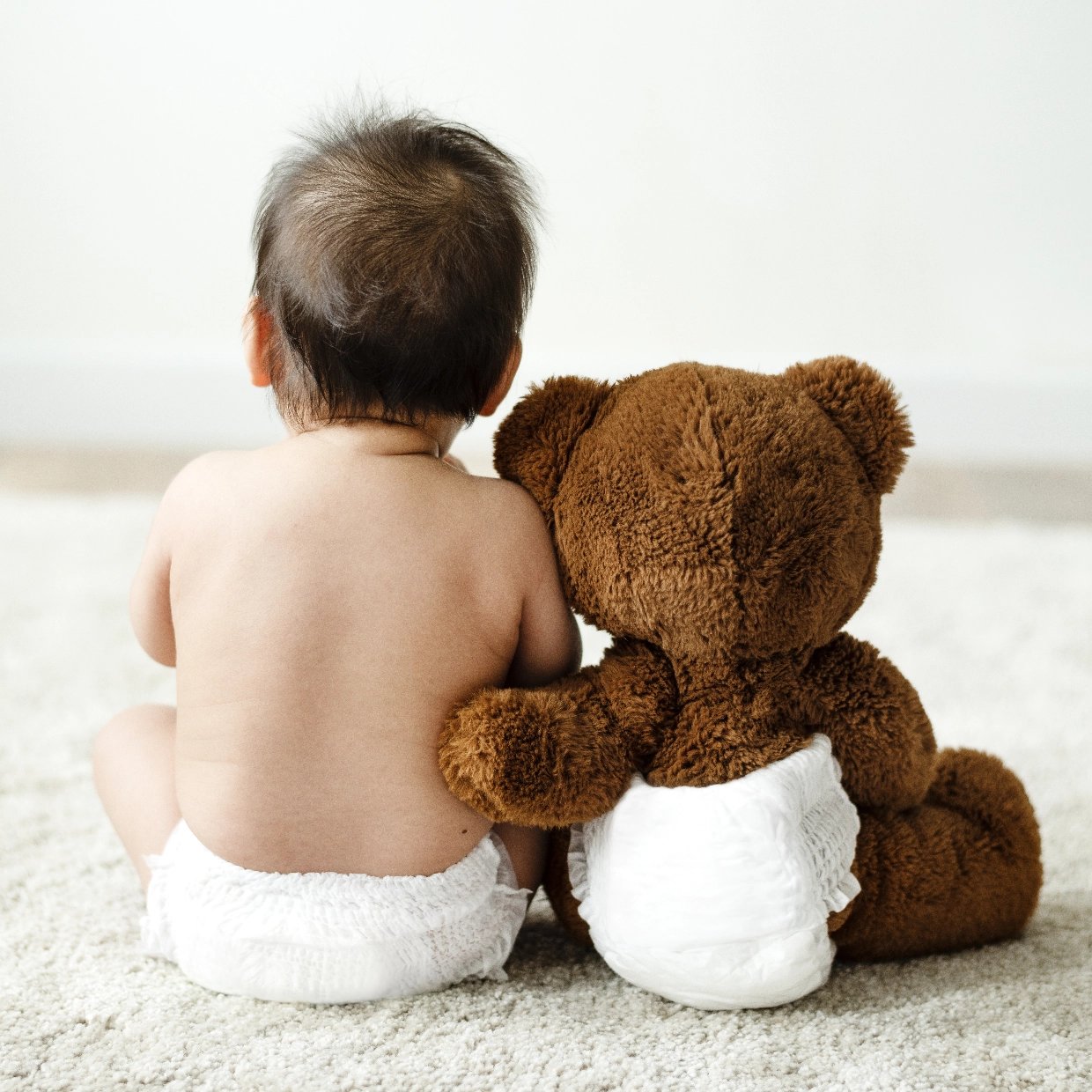 Kind mit Teddybär